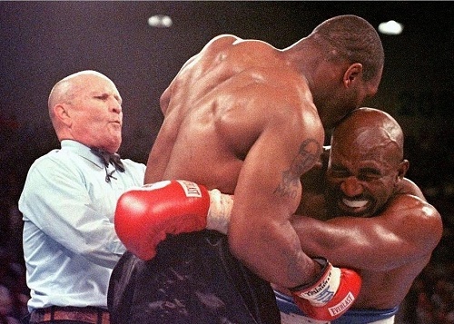 Mike Tyson bite Evander Holyfield ear in 1997 fight.