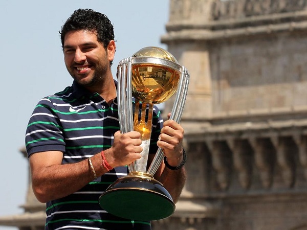 Yuvraj Singh holds 2011 world cup trophy